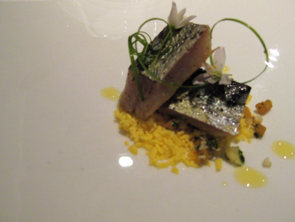 salted mackerel on a bed of egg yolk crumbles